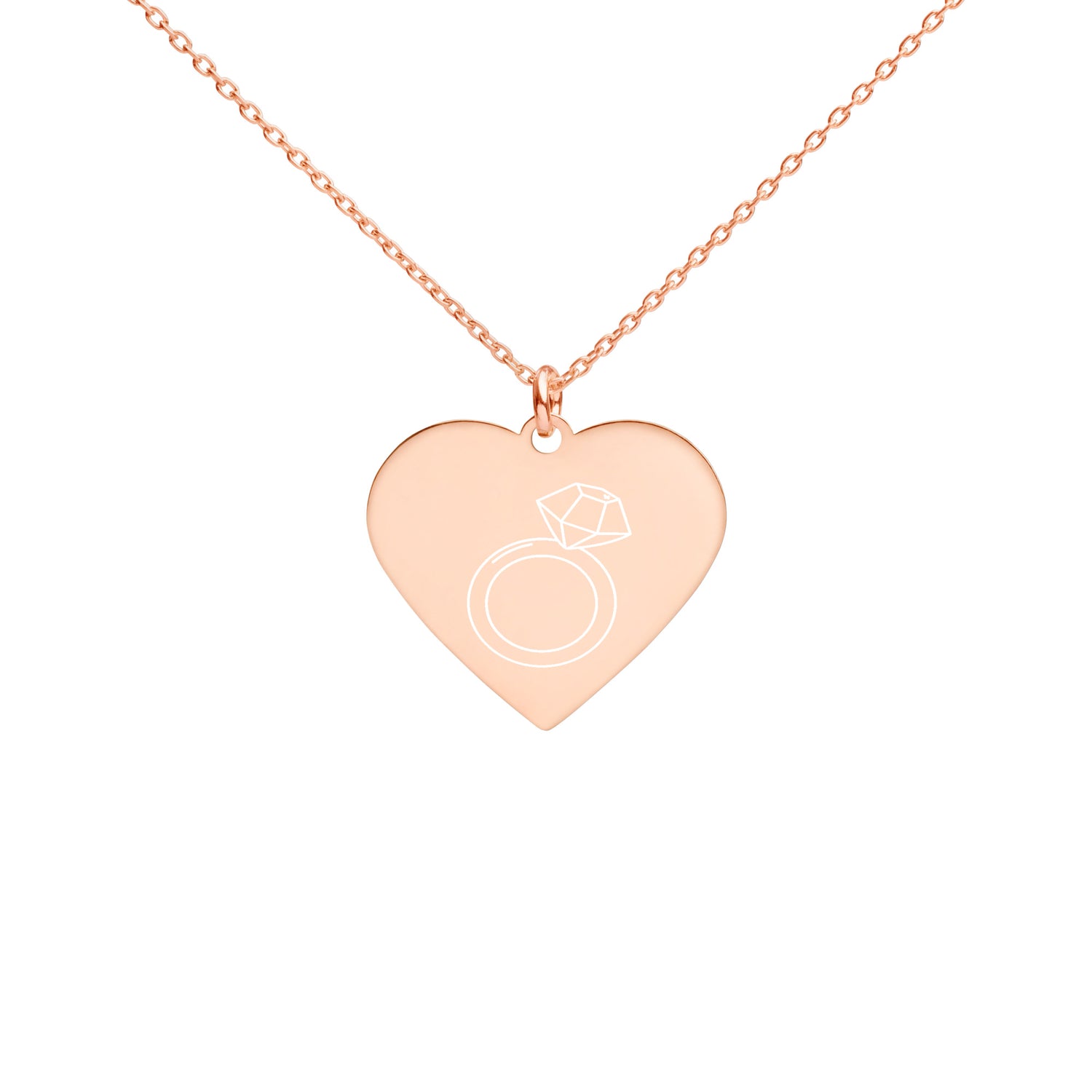 This engraved chain necklace with a sterling silver heart-shaped pendant makes for a perfect accessory for anyone in love with minimalistic and sophisticated jewelryEngraved Silver Heart Necklace