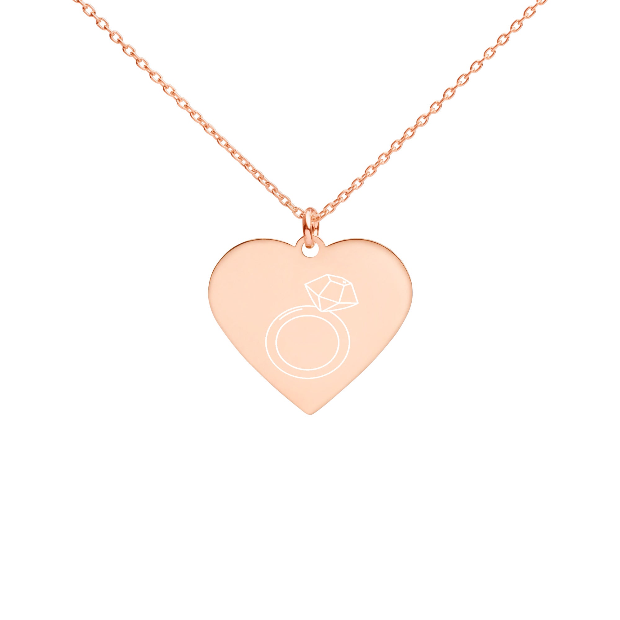 This engraved chain necklace with a sterling silver heart-shaped pendant makes for a perfect accessory for anyone in love with minimalistic and sophisticated jewelryEngraved Silver Heart Necklace