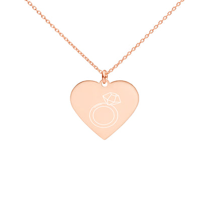 This engraved chain necklace with a sterling silver heart-shaped pendant makes for a perfect accessory for anyone in love with minimalistic and sophisticated jewelryEngraved Silver Heart Necklace