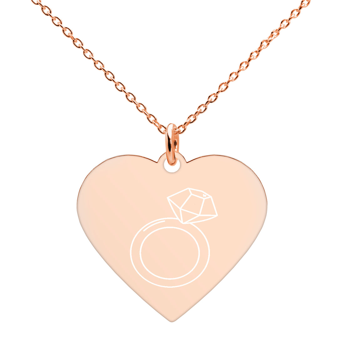 This engraved chain necklace with a sterling silver heart-shaped pendant makes for a perfect accessory for anyone in love with minimalistic and sophisticated jewelryEngraved Silver Heart Necklace