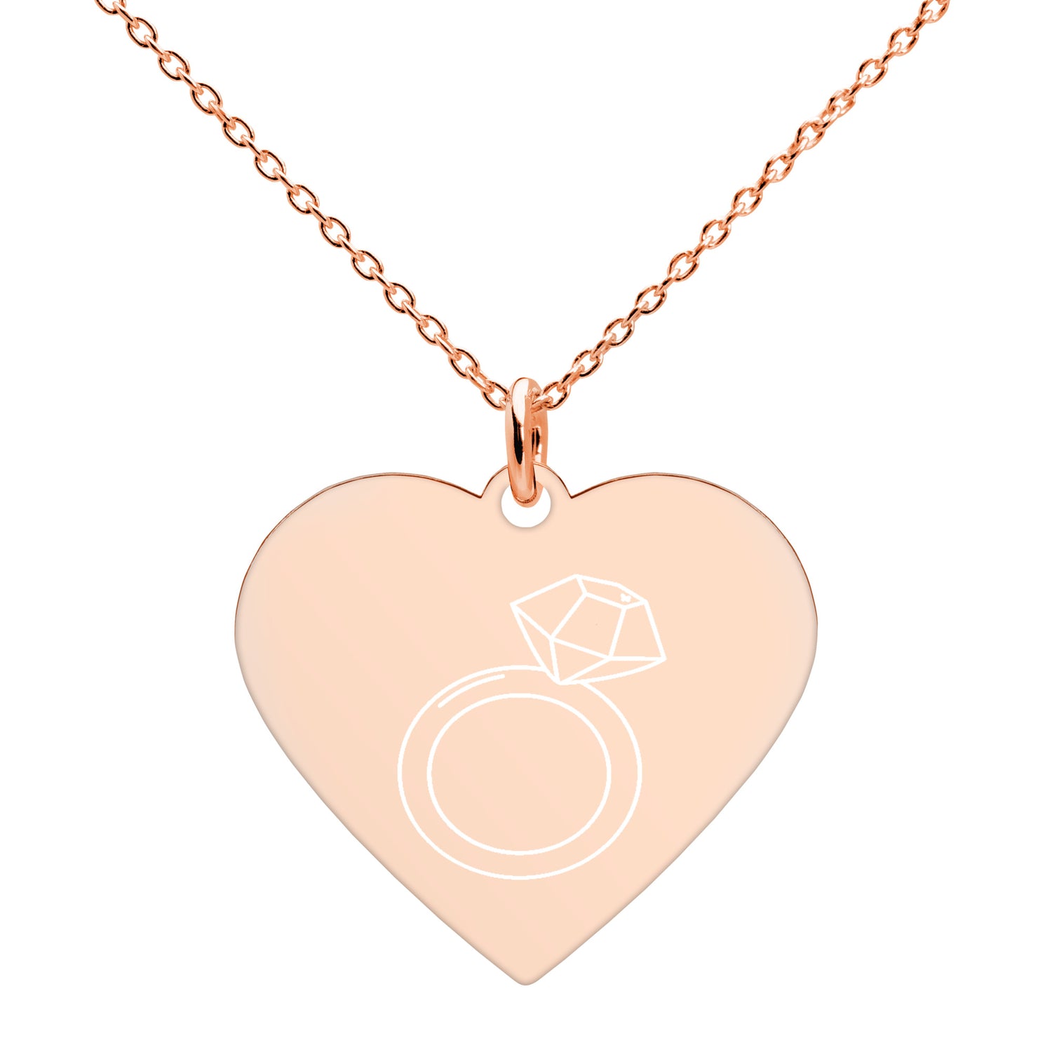 This engraved chain necklace with a sterling silver heart-shaped pendant makes for a perfect accessory for anyone in love with minimalistic and sophisticated jewelryEngraved Silver Heart Necklace