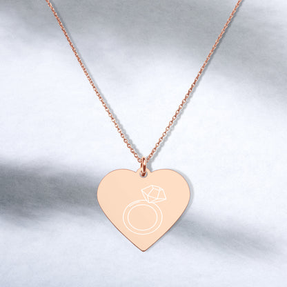 This engraved chain necklace with a sterling silver heart-shaped pendant makes for a perfect accessory for anyone in love with minimalistic and sophisticated jewelryEngraved Silver Heart Necklace