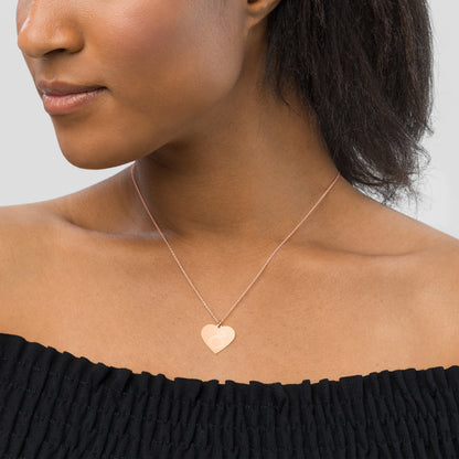 This engraved chain necklace with a sterling silver heart-shaped pendant makes for a perfect accessory for anyone in love with minimalistic and sophisticated jewelryEngraved Silver Heart Necklace