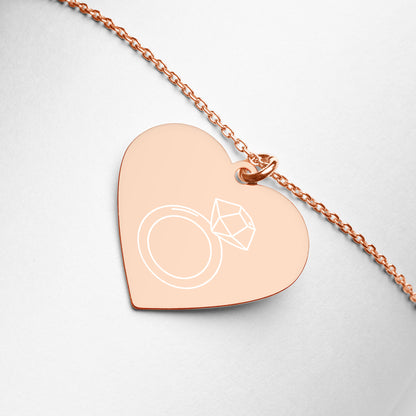 This engraved chain necklace with a sterling silver heart-shaped pendant makes for a perfect accessory for anyone in love with minimalistic and sophisticated jewelryEngraved Silver Heart Necklace