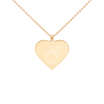 This engraved chain necklace with a sterling silver heart-shaped pendant makes for a perfect accessory for anyone in love with minimalistic and sophisticated jewelryEngraved Silver Heart Necklace