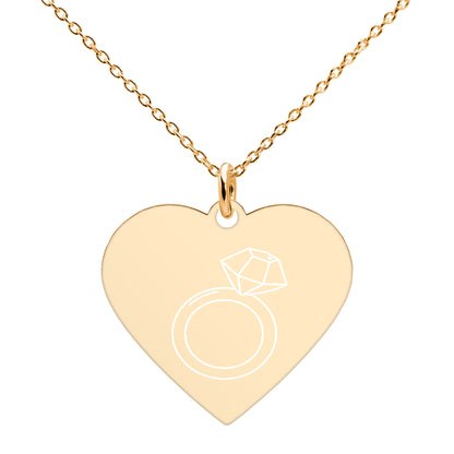 This engraved chain necklace with a sterling silver heart-shaped pendant makes for a perfect accessory for anyone in love with minimalistic and sophisticated jewelryEngraved Silver Heart Necklace